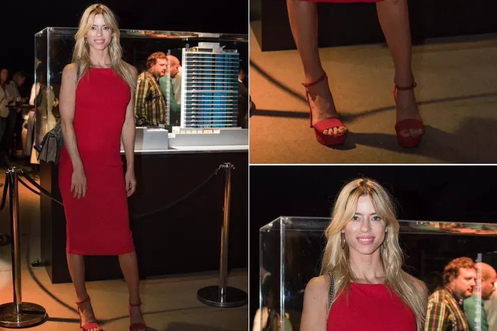 Nicole Neumann, con un vestido rojo pasión con hombros al descubierto en el inicio de obra de Las Lomitas Street Residence