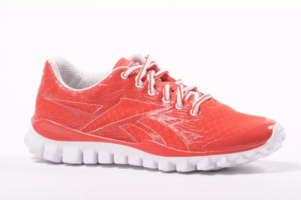 Reebok Realflex en coral, $529