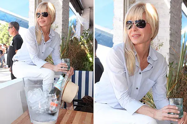 Karina Rabolini fue otra de las famosas que aprovechó para tomar algo en el Chandon Bar. Eligió un look en tonos claros y sombrero para combatir el calor