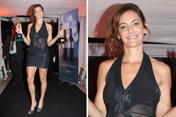 Luciana Aymar con vestido corto y con transparencias en la cintura para recibir el premio Olimpia. Poco acertado.
