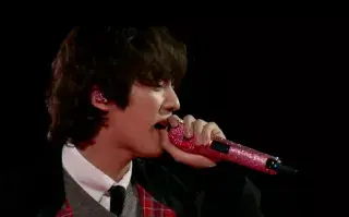 Jin durante el recital de Coldplay.