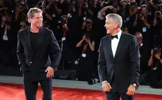 Brad Pitt y George Clooney en el Festival de Venecia.