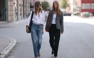 Tendencia Demure: el estilo clásico, elegante y chic que se usará esta primavera Amigas invitadas a uno de los desfiles de la semana de la moda de Copenhagen
