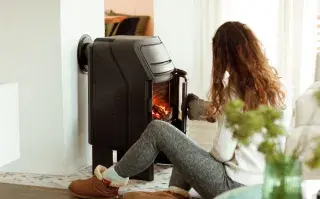 ¿Estufa, calefactor o aire? La guía definitiva para elegir según el tamaño de tu ambiente Foto de living.