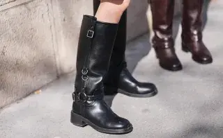 Cómo usar botas altas sin que el look quede recargado Una mujer usando botas XL